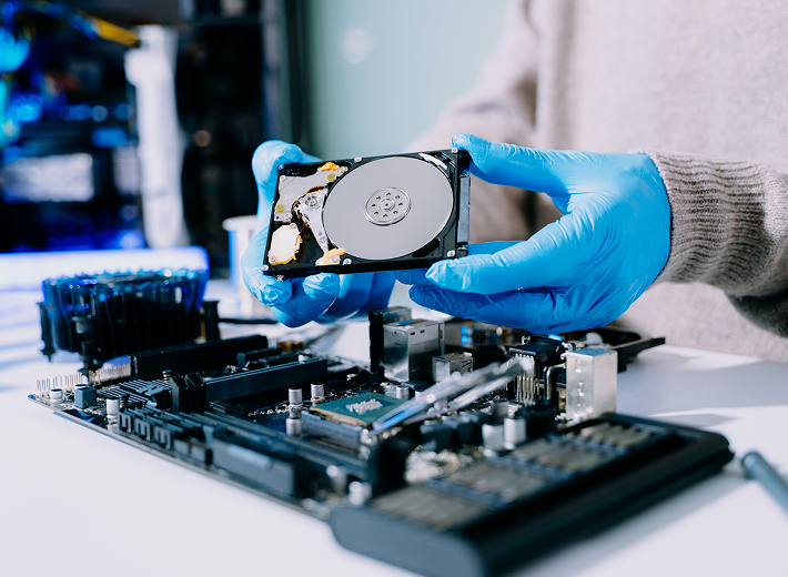 Technician handling computer components